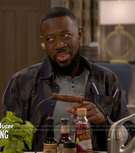 Malcolm’s camo print shirt on The Neighborhood