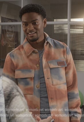 Marcus’s orange tie dye jacket on All American Homecoming