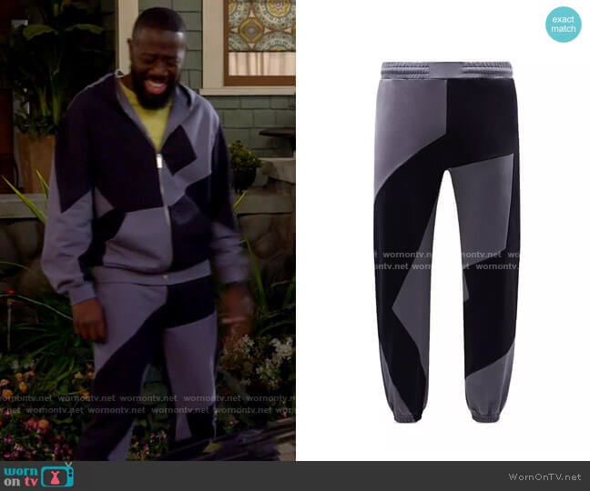 McQ Dazzle Color Block Sweatpants worn by Malcom (Sheaun McKinney) on The Neighborhood