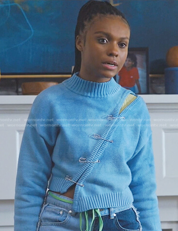 Naomi’s blue safety pin sweater on Naomi