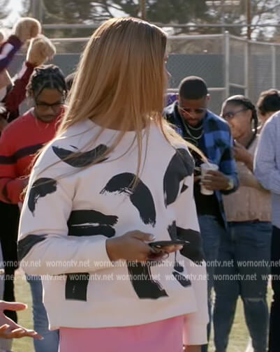 Nathaniel’s white paint stroke print sweater on All American Homecoming