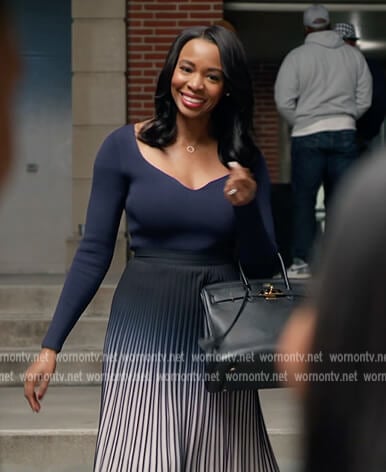 Navy sweetheart top and pleated skirt on All American Homecoming
