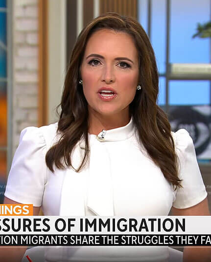 Nikki Batiste’s white tie neck dress on CBS Mornings