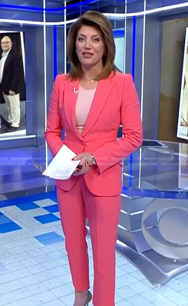 Norah’s pink blazer and trousers on CBS Evening News