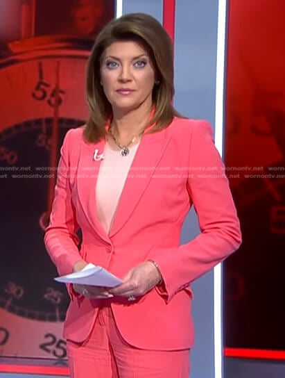 Norah’s pink blazer and trousers on CBS Evening News