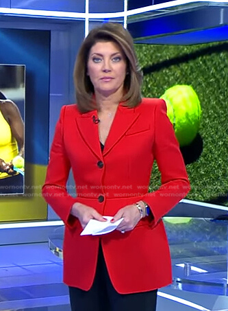Norah’s red peplum blazer on CBS Evening News