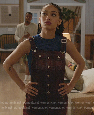Olivia’s denim overalls and blue mesh top on All American