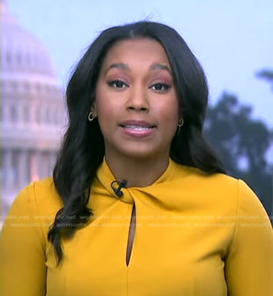 Rachel’s yellow twisted neckline dress on Good Morning America