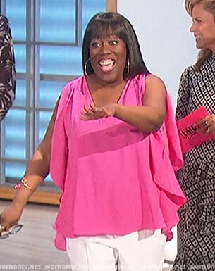 Sheryl’s pink ruffle sleeve top on The Talk