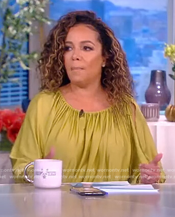 Sunny’s green off shoulder asymmetric dress on The View