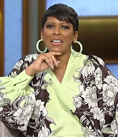 Tamron’s floral print puff sleeve mini dress on Tamron Hall Show
