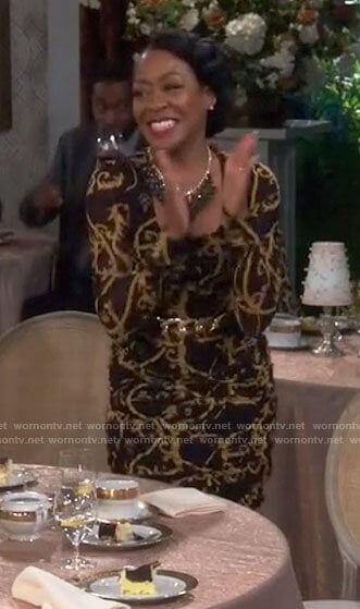 Tina’s black rope print dress on The Neighborhood