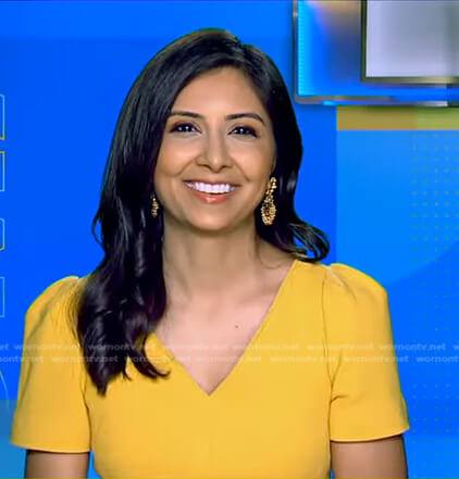 Zohreen Shah’s yellow v-neck dress on Good Morning America