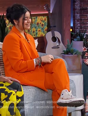 Iman Vellani’s orange double breasted blazer on The Kelly Clarkson Show