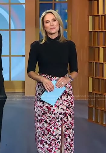 Amy’s black mock neck top and abstract print skirt on Good Morning America