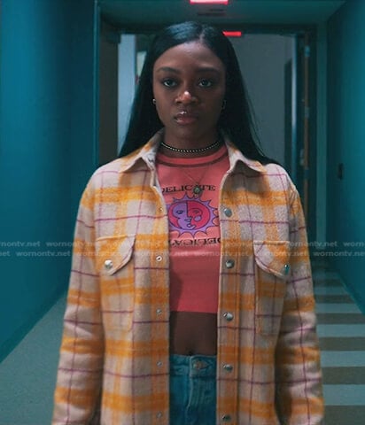 Cal’s print cropped tank and yellow plaid Jacket on First Kill