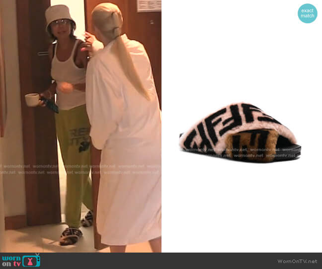 Fendi Logo Print Shearling Cross Strap Slides worn by Lisa Rinna on The Real Housewives of Beverly Hills