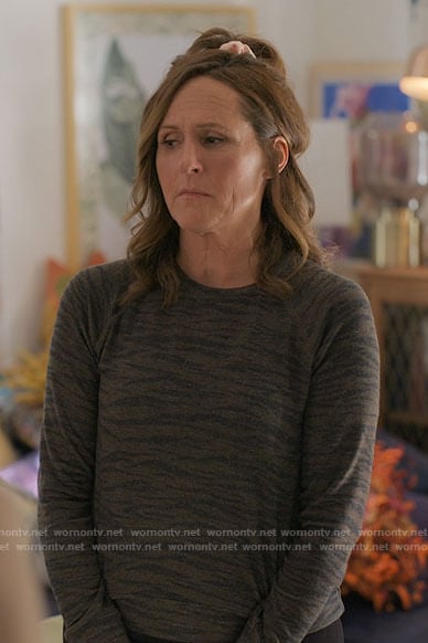Jackie’s green tiger stripe top on I Love That For You