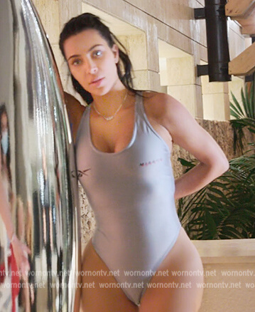 Kim’s silver metallic swimsuit on The Kardashians