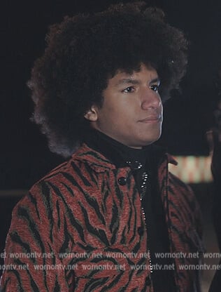 Lino’s red tiger stripe jacket on Tom Swift