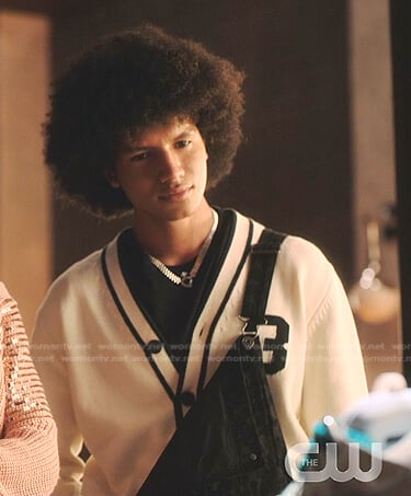 Lino’s white contrast trim cardigan on Tom Swift