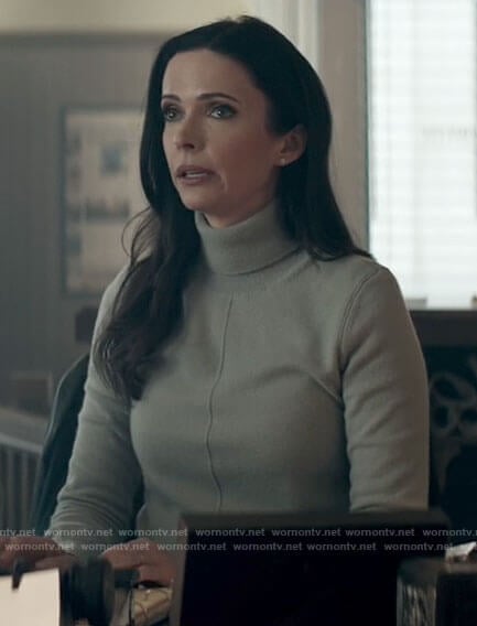 Lois’s light blue turtleneck sweater on Superman and Lois