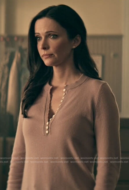 Lois’s lilac buttoned sweater on Superman and Lois