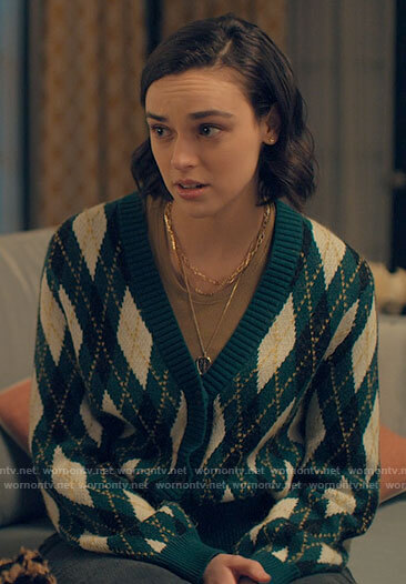 Lucy’s green argyle cardigan on Love Victor