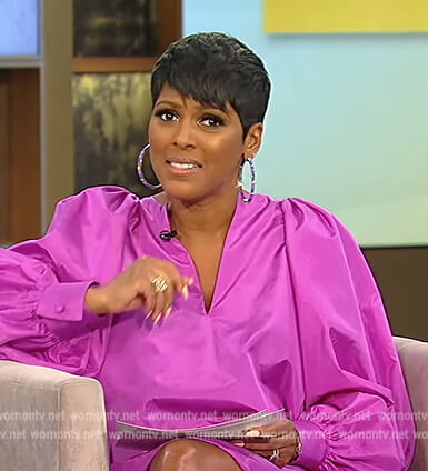 Tamron’s purple puff sleeve mini dress on Tamron Hall Show
