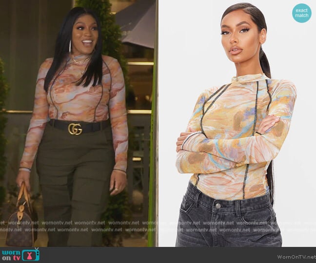 Pretty Little Thing Orange Mesh Acid Wash Bodysuit worn by Drew Sidora on The Real Housewives of Atlanta
