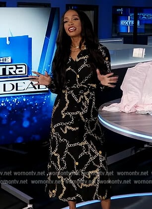 Rachel’s black chain print wrap dress on Extra