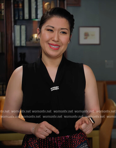 Sherri’s black tie neck blouse on All Rise