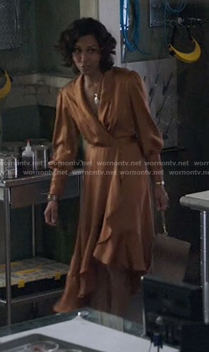 Shivani’s orange satin wrap dress on Roswell New Mexico