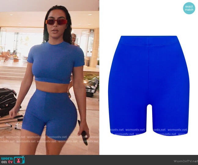 Skims Swim Mid Waist Shorts worn by Kim Kardashian (Kim Kardashian) on The Kardashians
