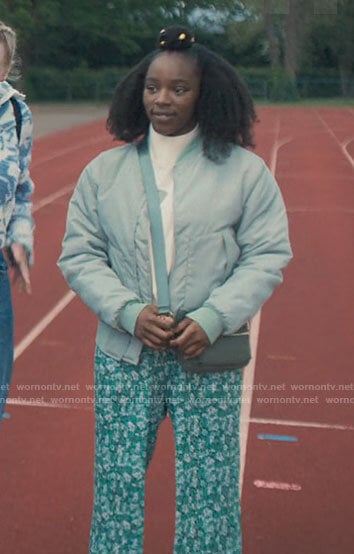 Tara’s green bomber jacket and floral pants on Heartstopper