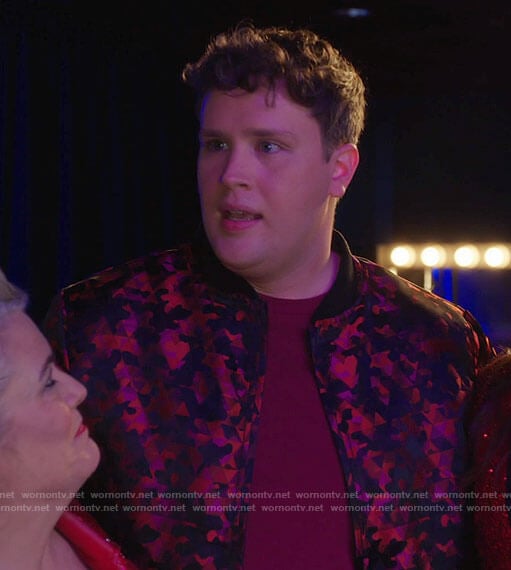 Tate’s red printed bomber jacket on Girls5eva