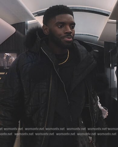 Tom’s black quilted jacket on Tom Swift