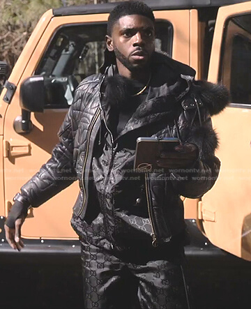 Tom’s black nylon jacket and pants on Tom Swift