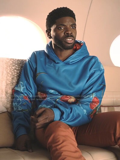 Tom’s blue hibiscus print hoodie on Tom Swift