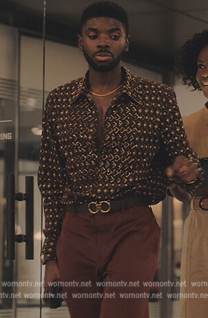 Tom’s gold buckle belt on Tom Swift