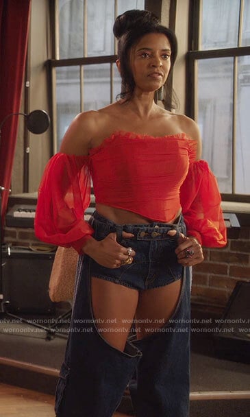 Wickie’s red off-shoulder corset top and cutout jeans on Girls5eva