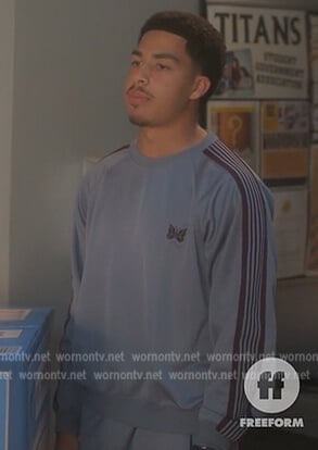 Junior’s blue sleeve stripe track jacket on Grown-ish