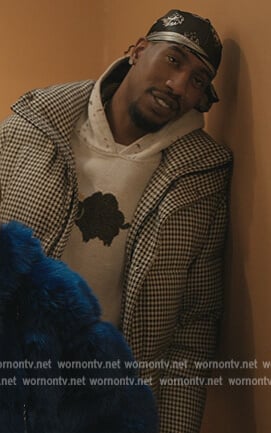 Rob’s houndstooth puffer jacket on The Chi