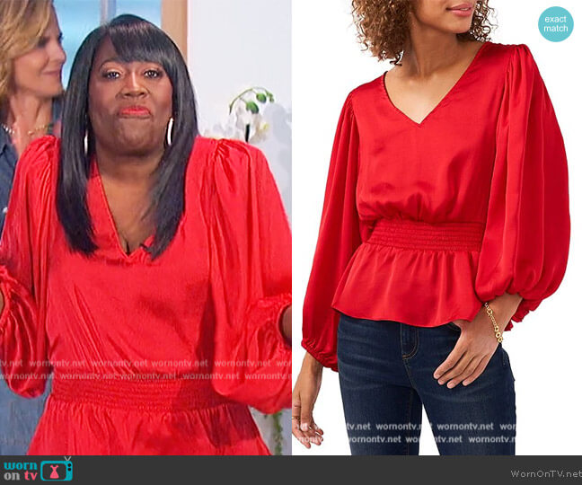 Vince Camuto V-Neck Long Sleeve Peplum Blouse worn by Sheryl Underwood on The Talk