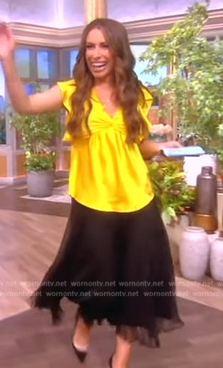 Alyssa Farah’s yellow flutter sleeve top on The View