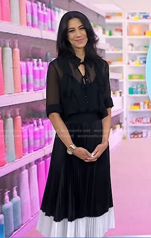 Dr. Natalie Azar’s black blouse and colorblock pleated skirt on Today