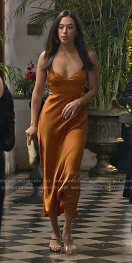 Jessie’s orange midi slip dress on Maggie