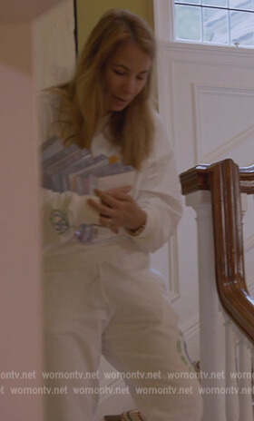 Jill’s white printed sweatshirt and pants on The Real Housewives Ultimate Girls Trip