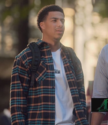 Junior’s black plaid shirt on Grown-ish