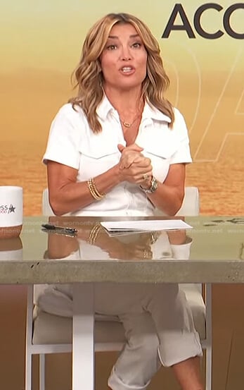 Kit’s white zip jumpsuit on Access Hollywood